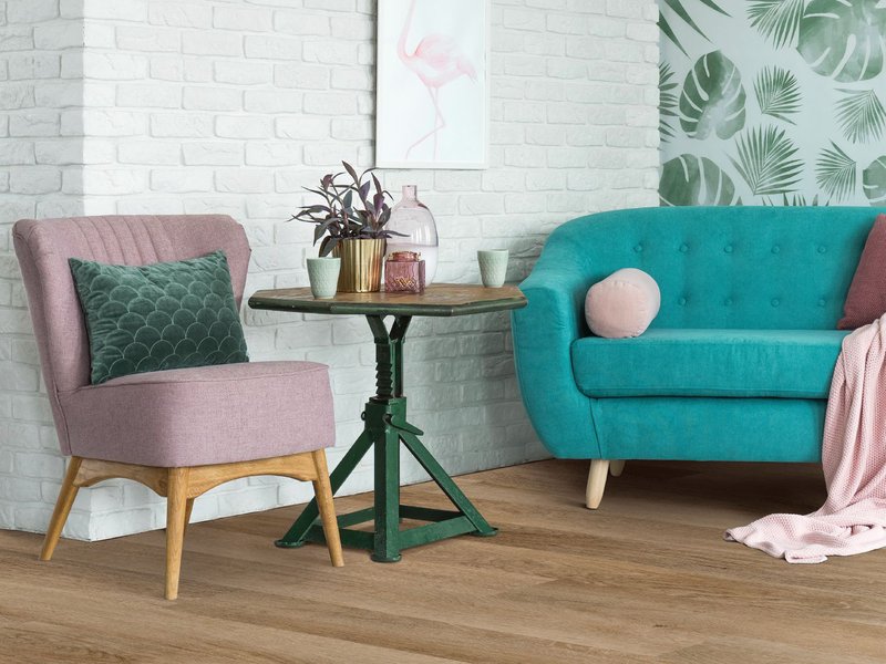 Living room with wood-look luxury vinyl flooring from Capitol Carpet in Dalton, GA
